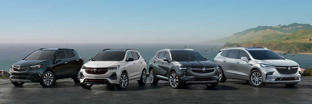 New Buick vehicles parked near the ocean