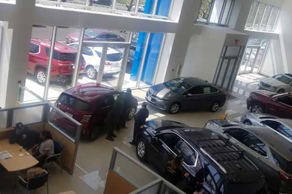 Bical Auto Mall Buick GMC in Brooklyn NY Dealership Building Interior with new vehicles